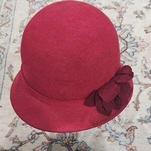 Claire's Vibrant Red Hat with Floral Detail